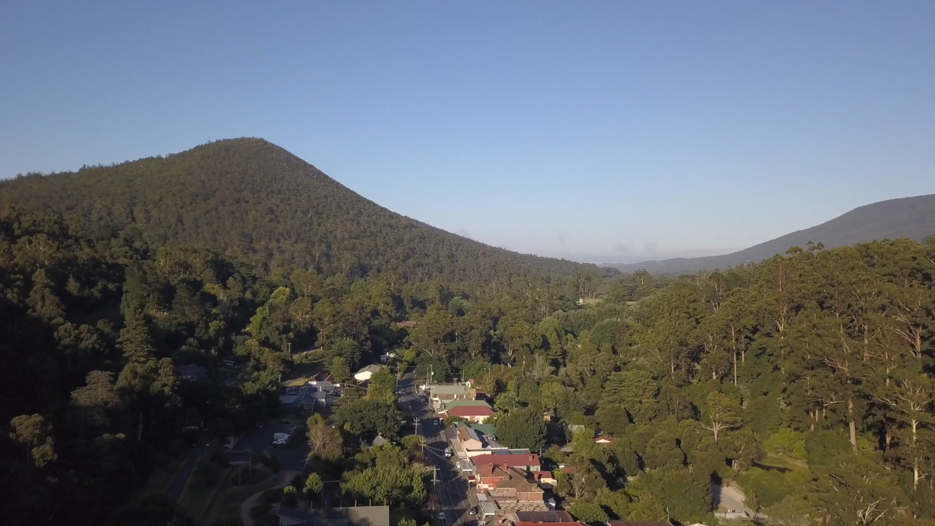 Drone view over Warburton township towards Mount Little Joe